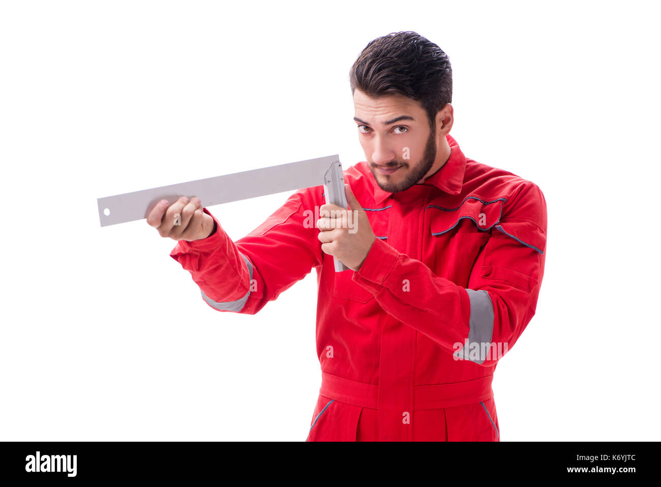 Young repairman with a square ruler isolated on white background Stock ...