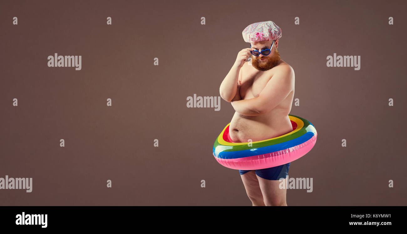Funny fat bearded man in a swimsuit Stock Photo - Alamy