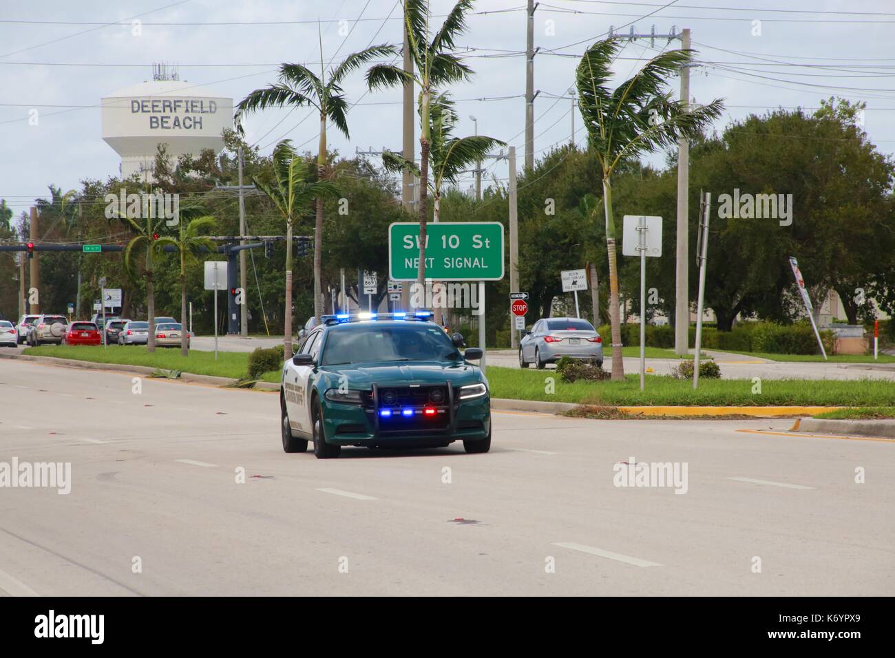 Broward County Sheriff Car with Its Lights Flashing Speeds By En Route