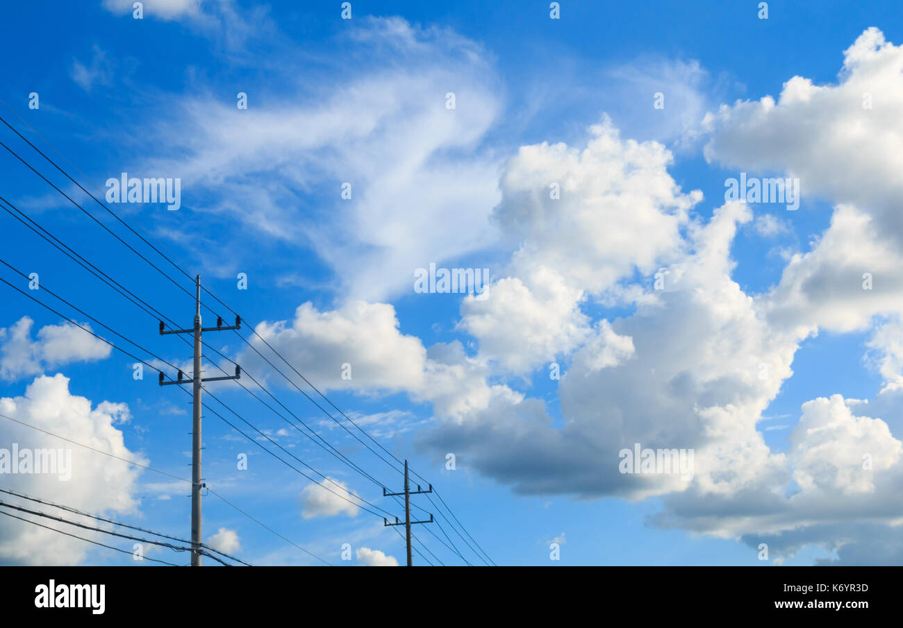 Blue sky and clouds with electric poles Stock Photo - Alamy