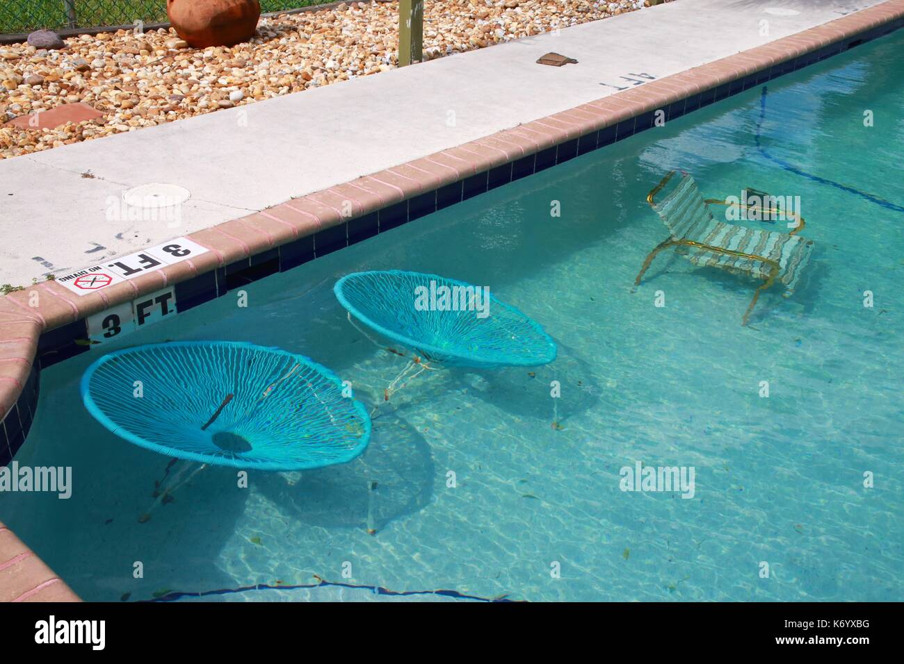 Deck Furniture at Crystal Lake Condominiums Intentionally Submerged in