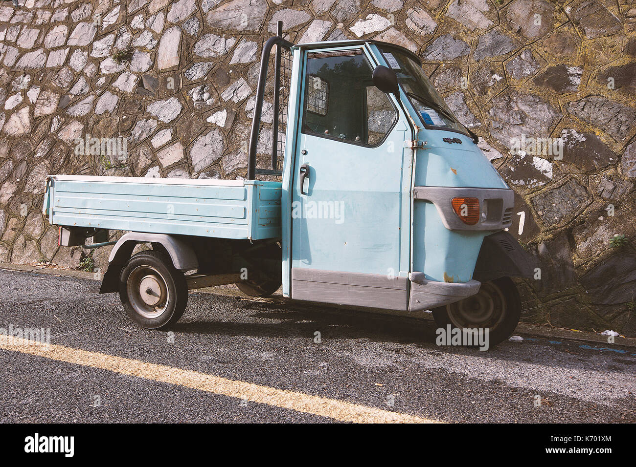 a fun light blue 'ape car' in the 5 terre, Liguria, italy Stock Photo