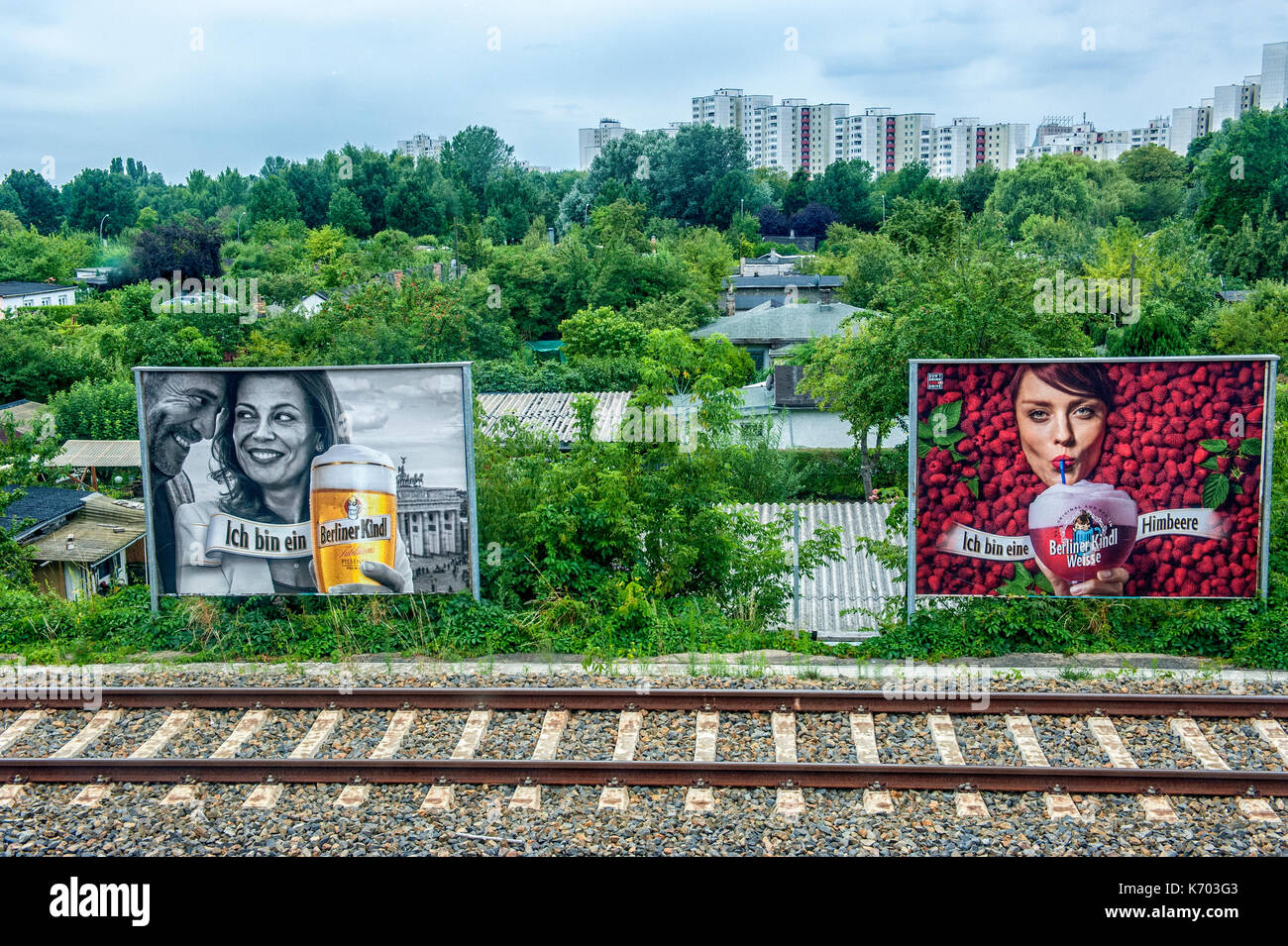 Germany Advertising posters along the binaries of a metro line, in the suburbs of Berlin Stock Photo