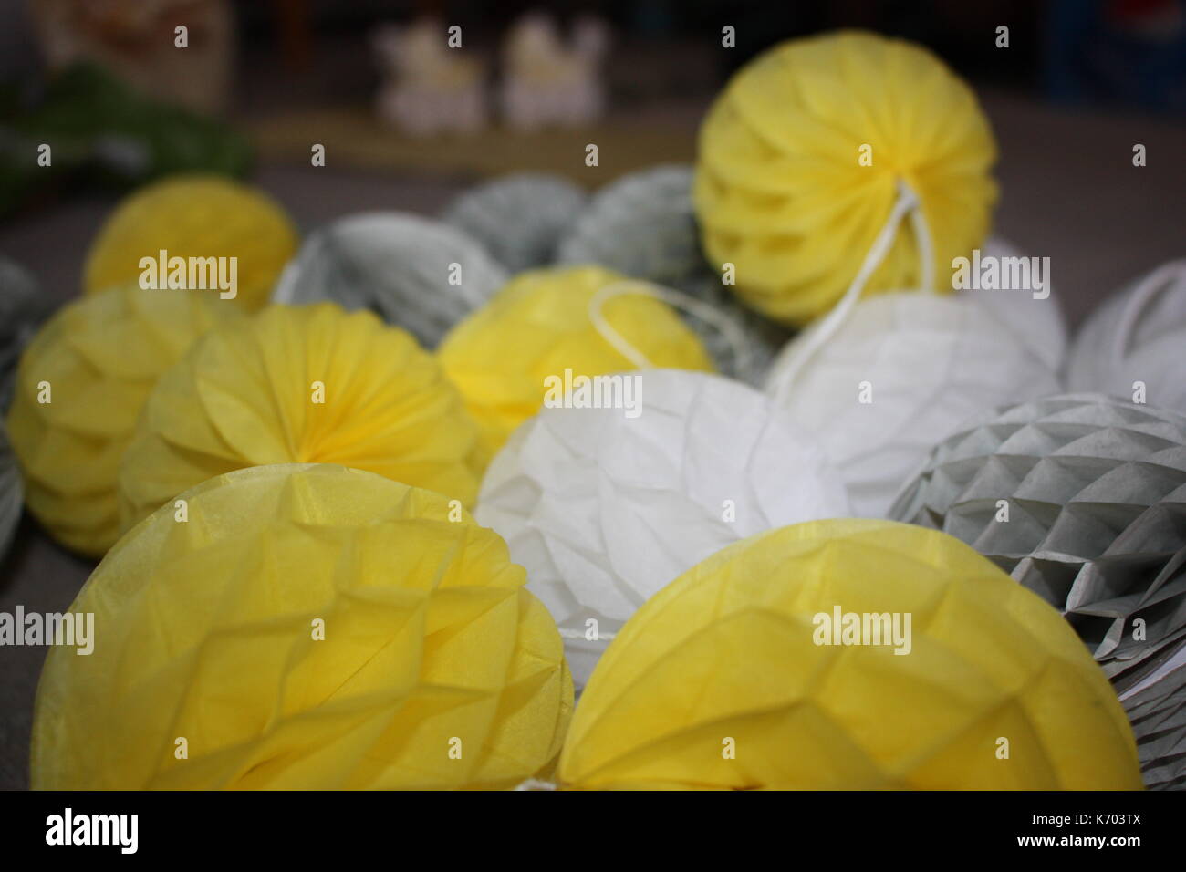 yellow, white, grey pom poms Stock Photo