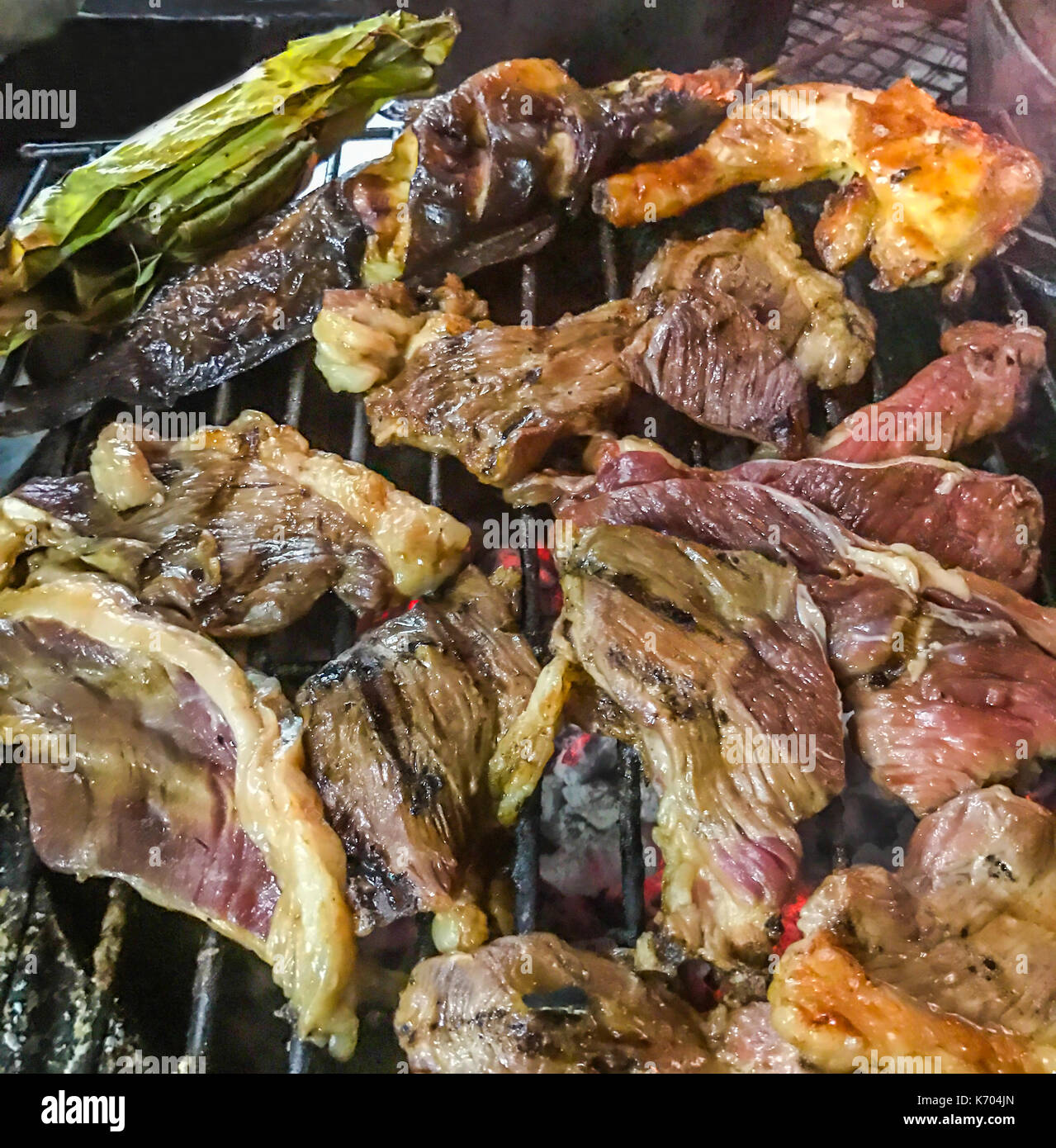 assorted meat from chicken, pork, beef, fish and vegetable cooked on