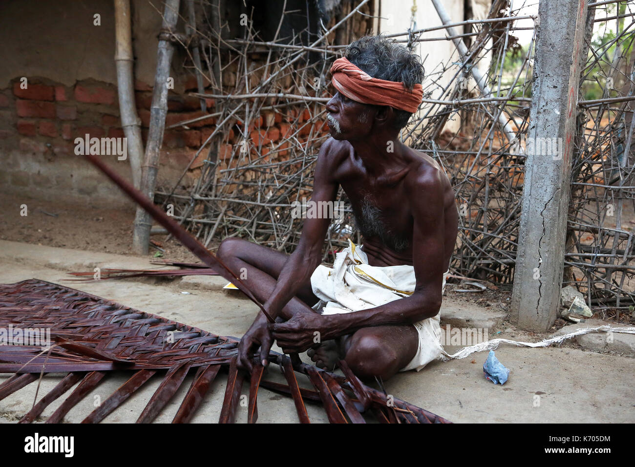 Village man worked street Stock Photo