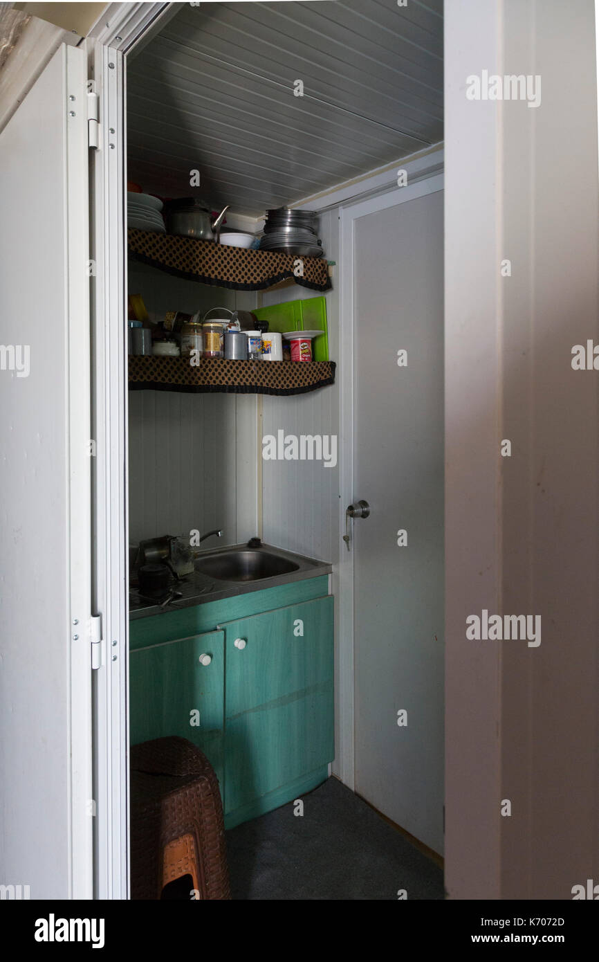 The kitchen is the entrance to the Isobox prefabricated housing for the Syrian refugees. Stock Photo