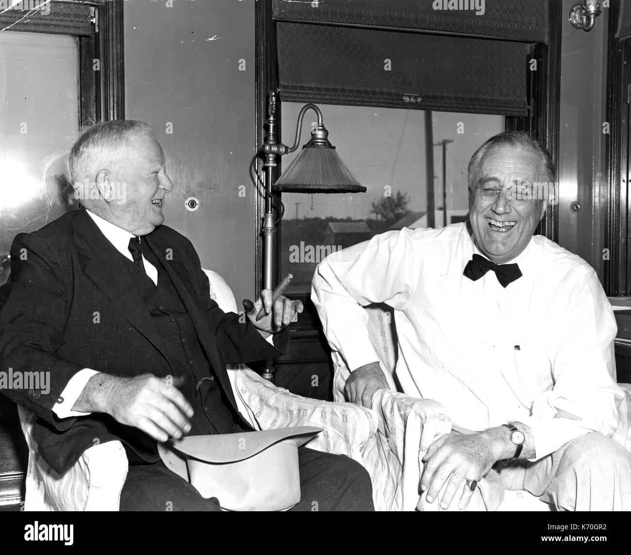 Uvalde, Texas - Former Vice President John Nance Garner amuses President Franklin D. Roosevelt. Uvalde, Texas, circa 1942. Stock Photo