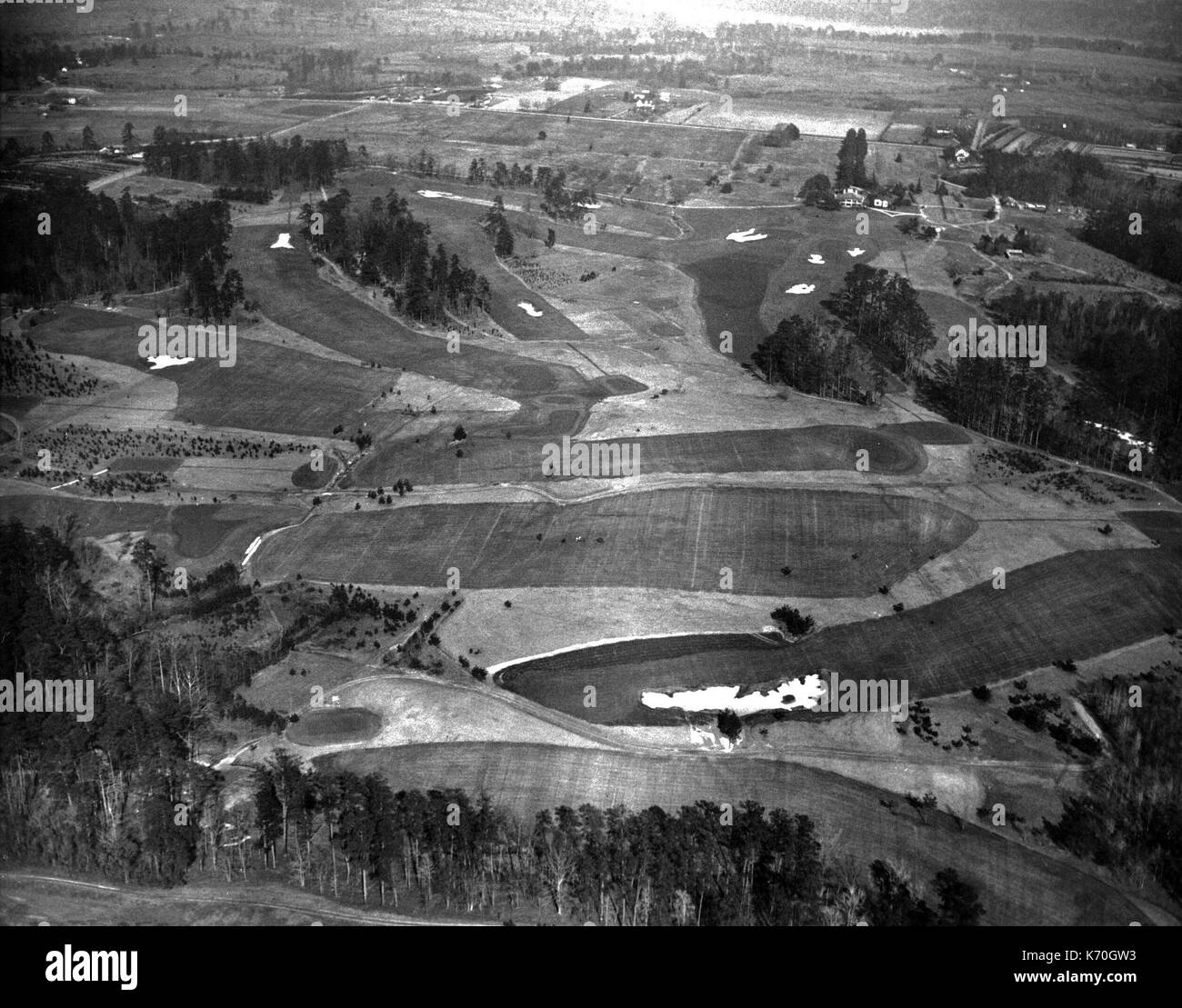 Augusta, GA - The perfect golf course, which has only 22 traps, known as the Augusta National Golf Club, laid out by Robert Tyre Jones, Jr., retired amateur and Open Champion and Dr. Alister Mackenzie, as it appears from the air. January 10, 1933. Stock Photo