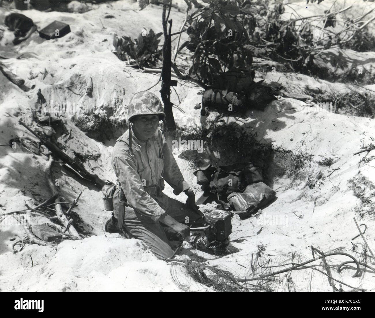 Saipan, July 1944 - Marine PFC Cecil G. Trosip at communication system on Saipan Stock Photo