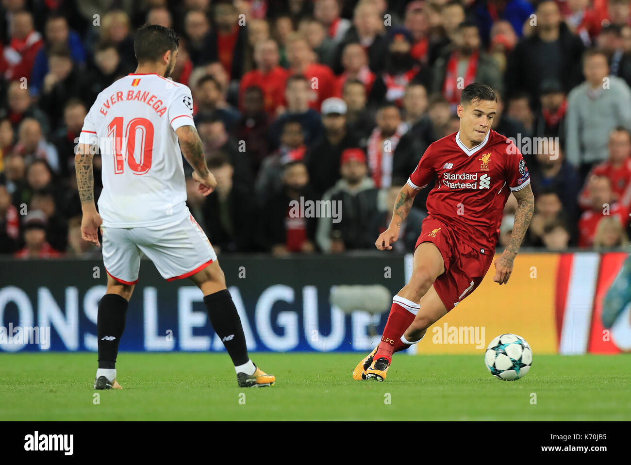 Liverpool's Philippe Coutinho gets away from Sevilla's Ever Banega during  the UEFA Champions League, Group E match at Anfield, Liverpool Stock Photo  - Alamy