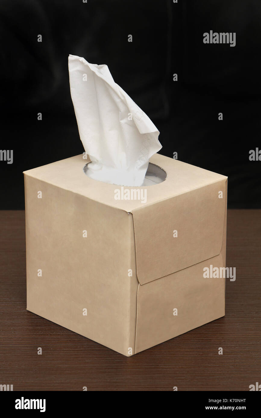 Box of paper tissues with one sticking from the top Stock Photo