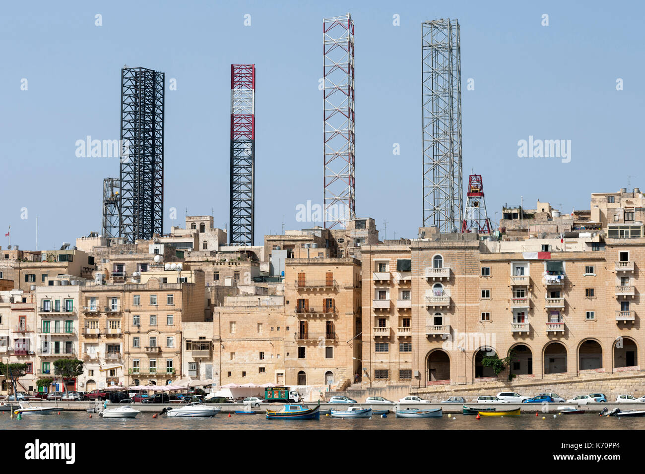 Jackup oil drilling rigs juxtaposed with the Senglea waterfront in