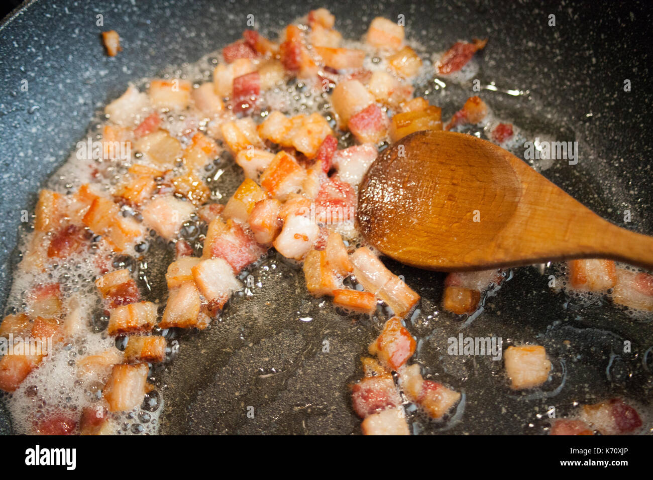 Crispy bacon on the frying pan Stock Photo Alamy