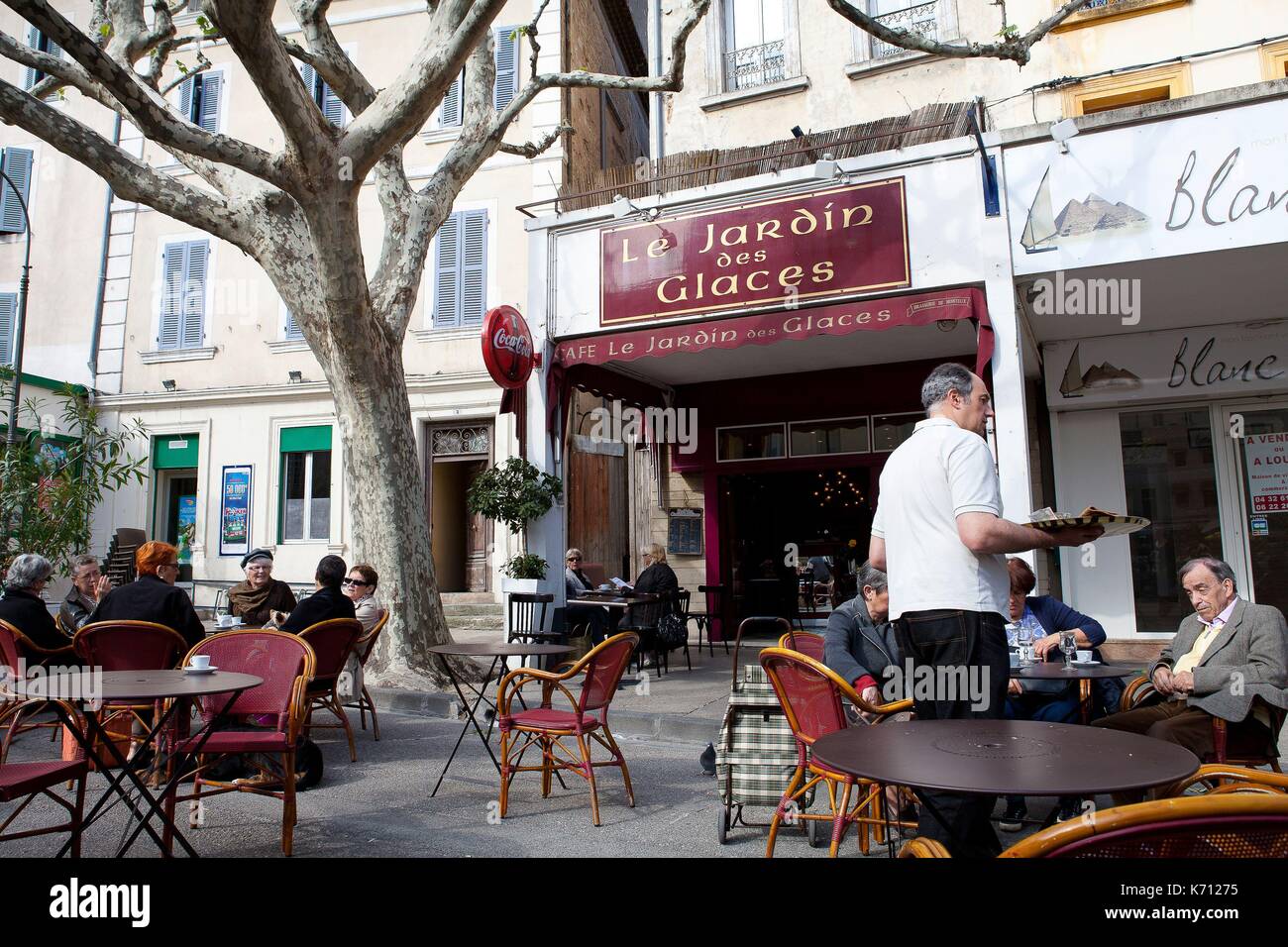 France, Vaucluse, Carpentras, bar PMU Garden of Mirrors, place de la Mairie Stock Photo