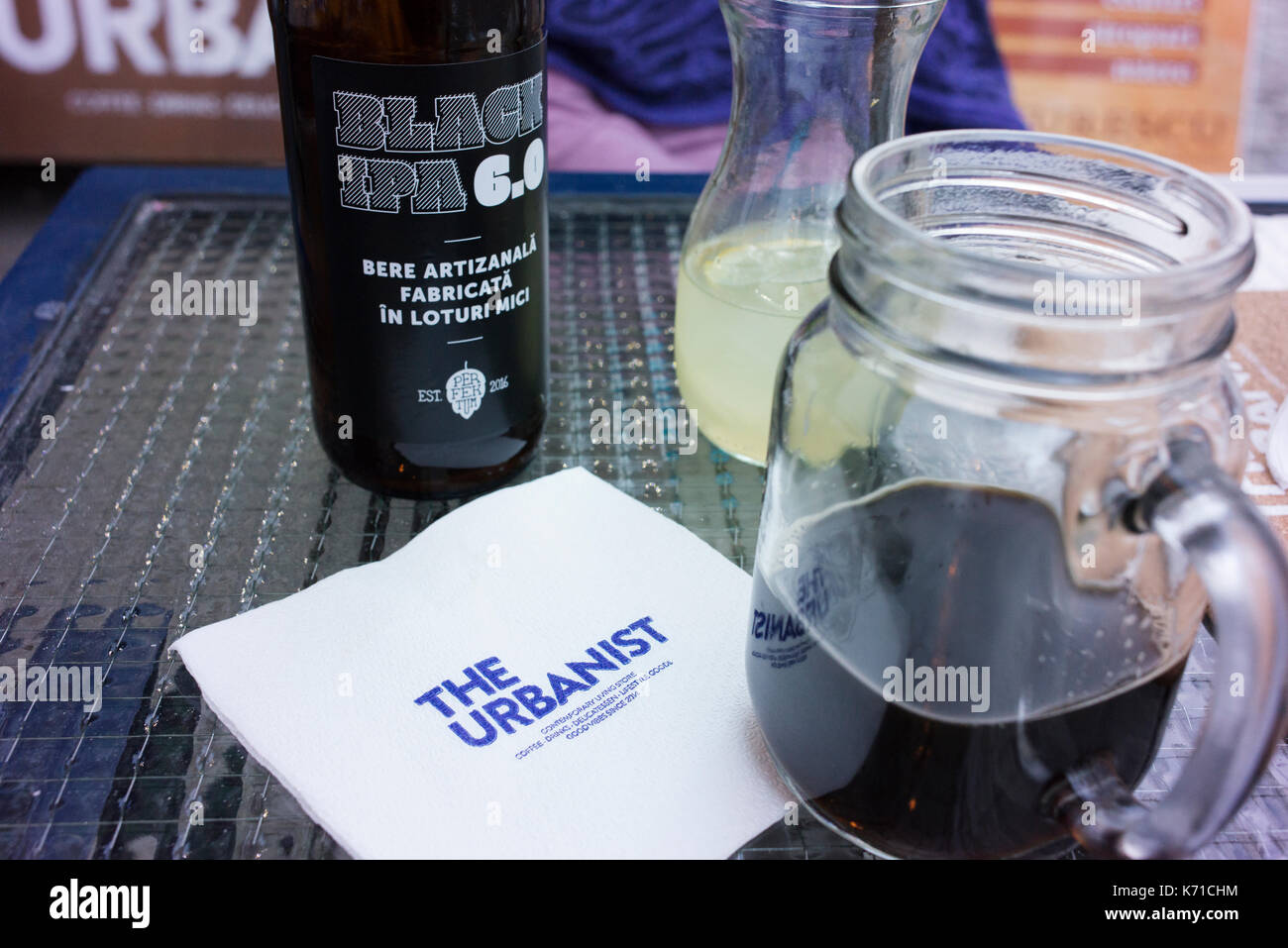 A bottle of Black IPA at The Urbanist, a trendy hip bar in Bucharest's old town. Stock Photo