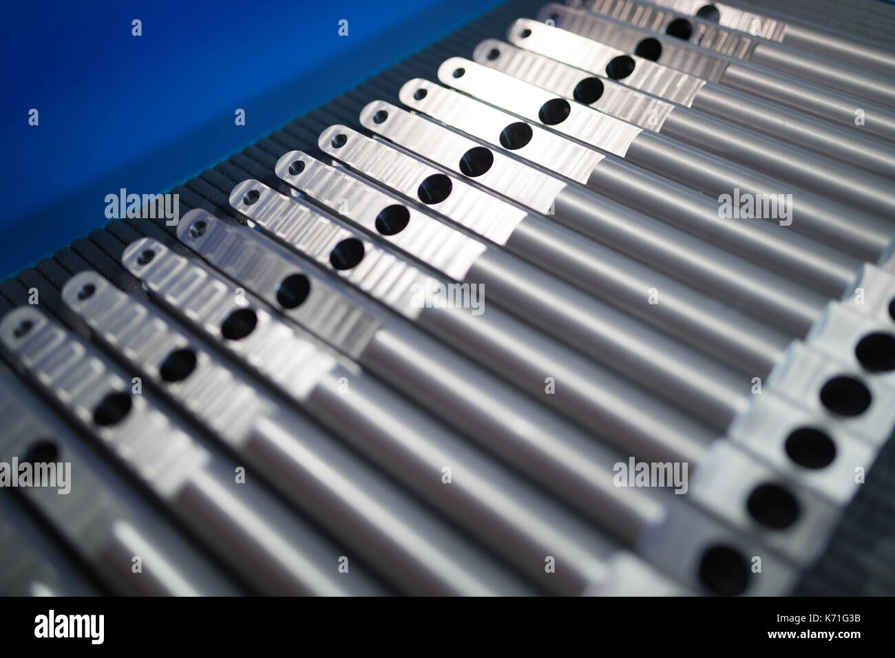 aluminum metal raw material in the form of long rods Stock Photo