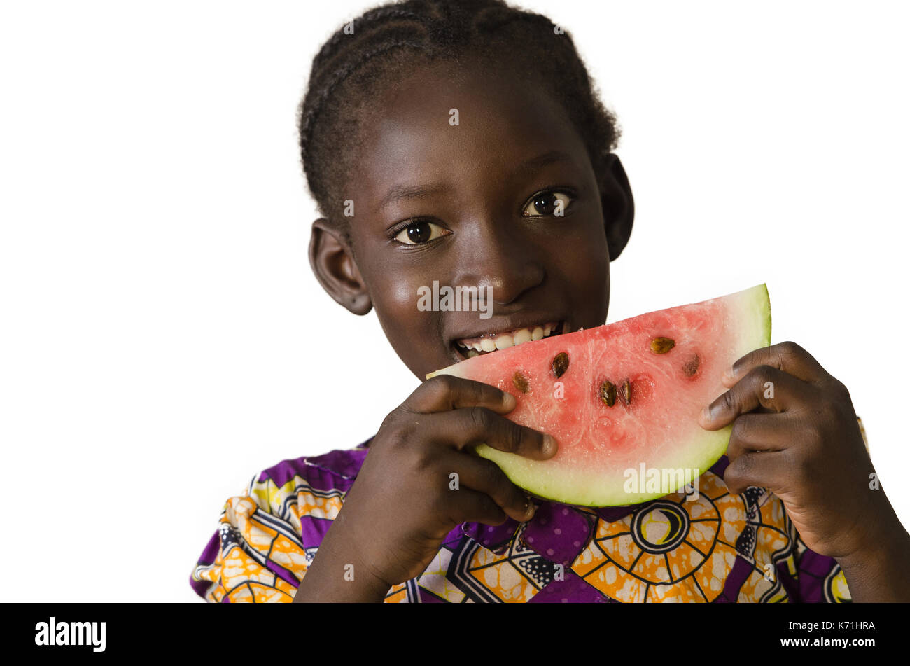 African black child eating some watermelon, isolated on white