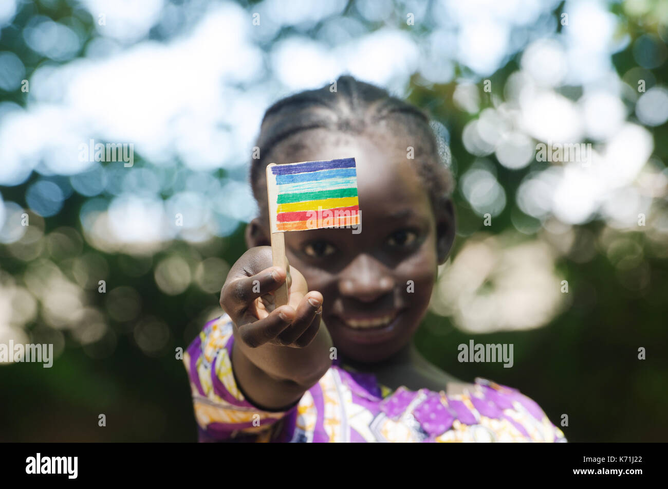 Young black African girl showing peace flag with her hands Stock Photo