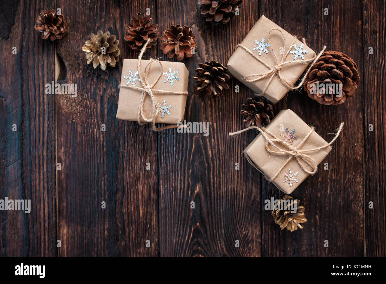 gift christmas boxes on a wooden background Stock Photo