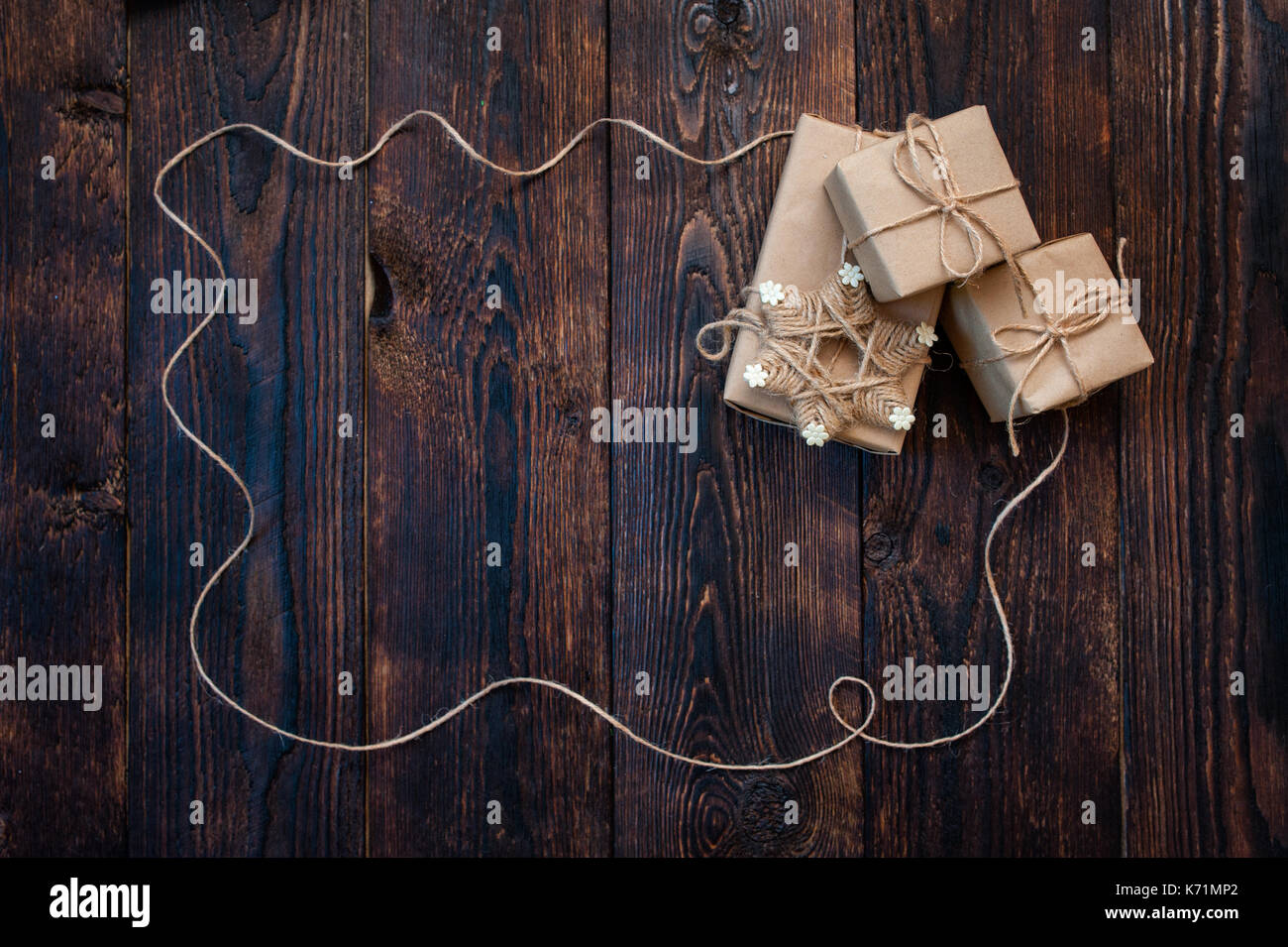 gift christmas boxes on a wooden background Stock Photo