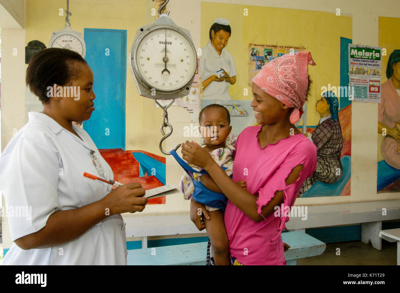 Mother and child consult a burse, public health service, Moshi, Kilimanjaro region, Tanzania Stock Photo