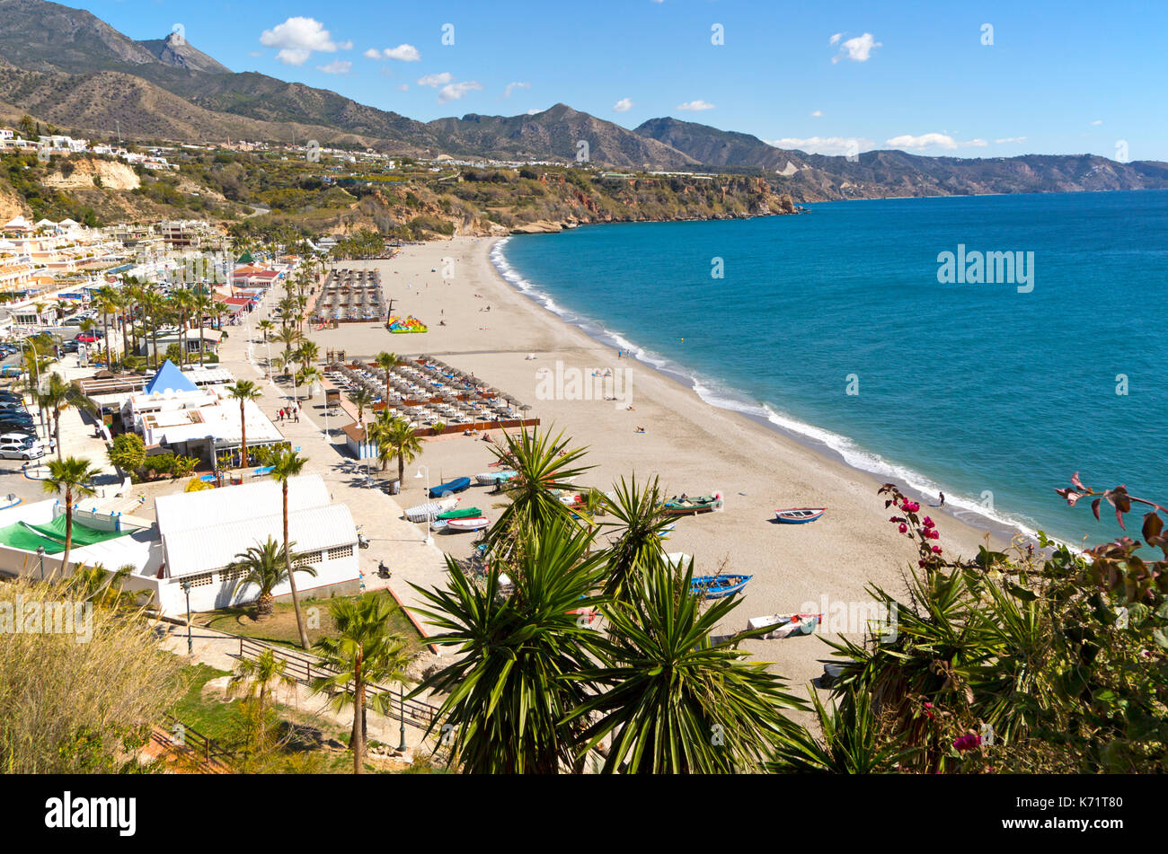 Playa Burriana sandy beach at popular holiday resort town of Nerja, Malaga province, Spain Stock Photo