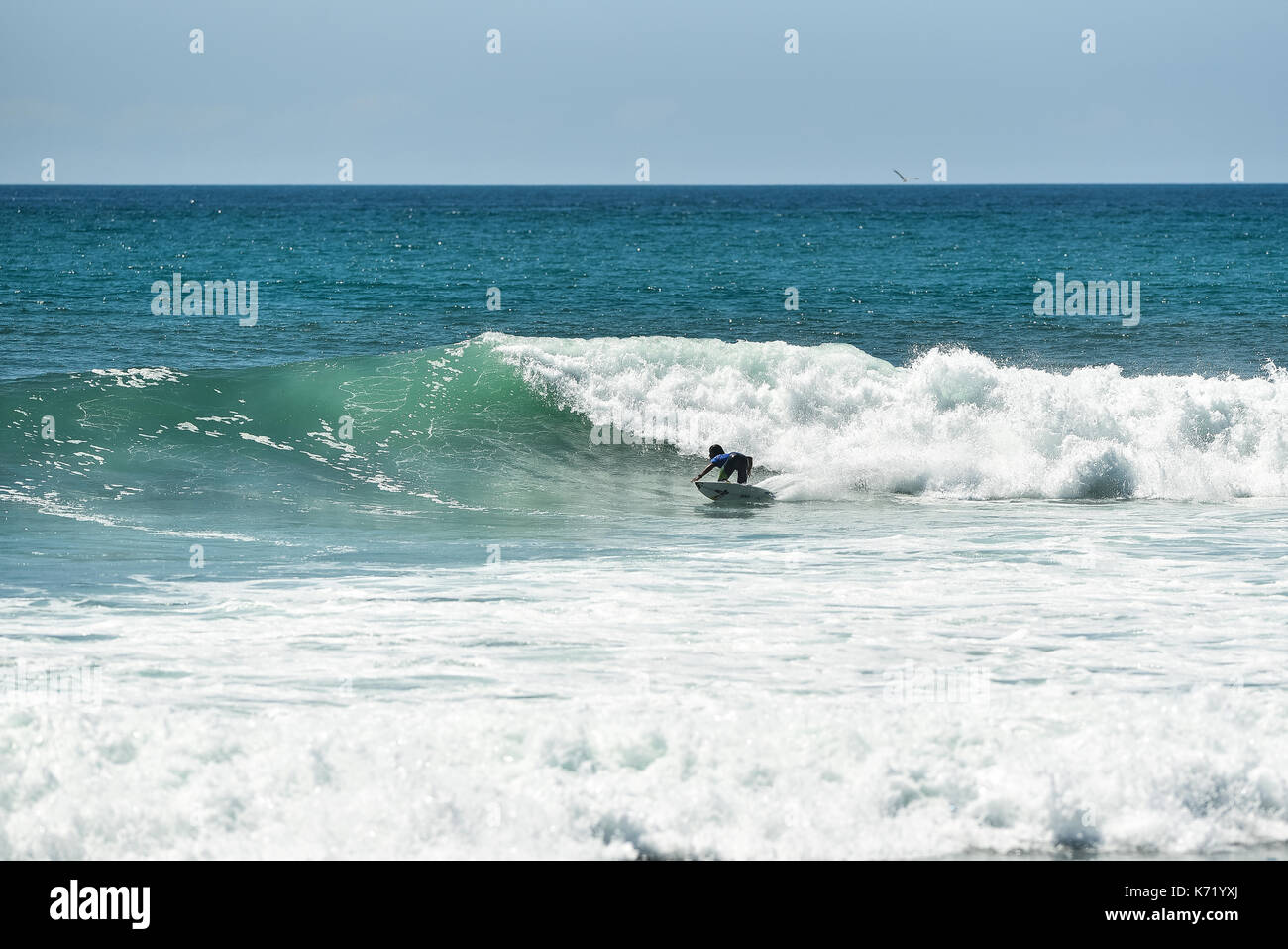 San Clemente, USA. 13 September, 2017.  Surfers compete head to head during the 2017 Hurley Pro surf contest at Lower Trestles, San Onofre State Park, CA. Surfer: Kanoa Igarashi (USA). Credit: Benjamin Ginsberg/Alamy Live News. Stock Photo