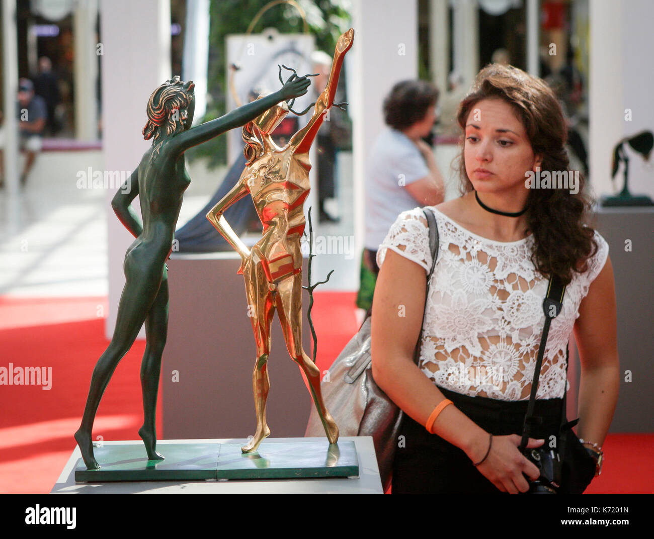 Vancouver, Canada. 13th Sep, 2017. A visitor looks at Salvador Dali's 'Homage To Terpsichore' bronze sculpture at the 'Definitely Dali' exhibition in Vancouver, Canada, Sept. 13, 2017. Credit: Liang Sen/Xinhua/Alamy Live News Stock Photo
