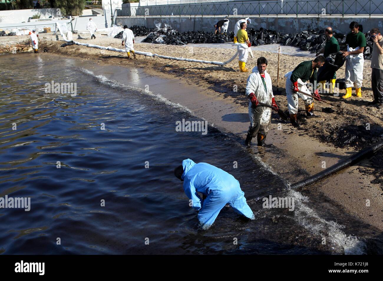 Athens, Greece. 14th Sep, 2017. Greek officials traded accusations Wednesday after an oil spill from a sunken tanker drifted to other parts of the Saronic Gulf in Athens. The 45-year-old vessel Agia Zoni II sank on Sunday near the island of Salamis while under anchor. The cause is still unknown. The Greek-flagged tanker was carrying around 2,500 tonnes of fuel, some of which quickly covered beaches and coves on the southeastern side of Salami, opposite Athens and Piraeus. Credit: Aristidis Vafeiadakis/ZUMA Wire/Alamy Live News Stock Photo
