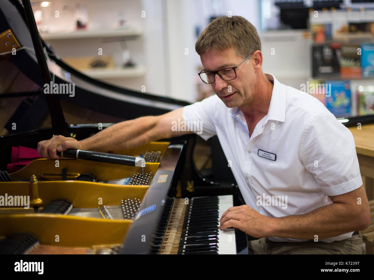 Dresden, Germany. 14th Sep, 2019. Piano maker Bert Kirsten intonates the  hammers of a piano during a press tour organised by the Chamber of Crafts  in Dresden, Germany, 14 September 2019. The