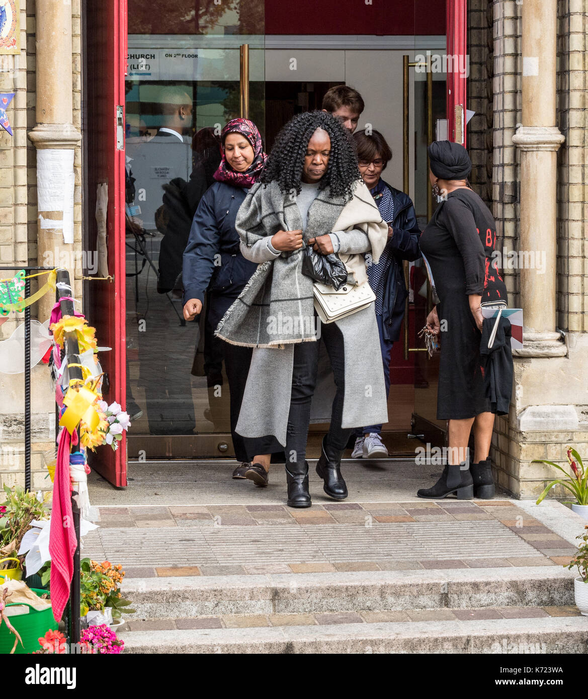 Kensington, London, UK. 14th Sep, 2017. Notting Hill Methodist Church was used for a live video feed from the Grenfell Tower inquiry and was attended by survivors and local residents who expressed a lack of confidence in the process. Several complained they had yet to be rehoused or compensated for their loss. Survivors leave the overflow inquiry Credit: Ian Davidson/Alamy Live News Stock Photo