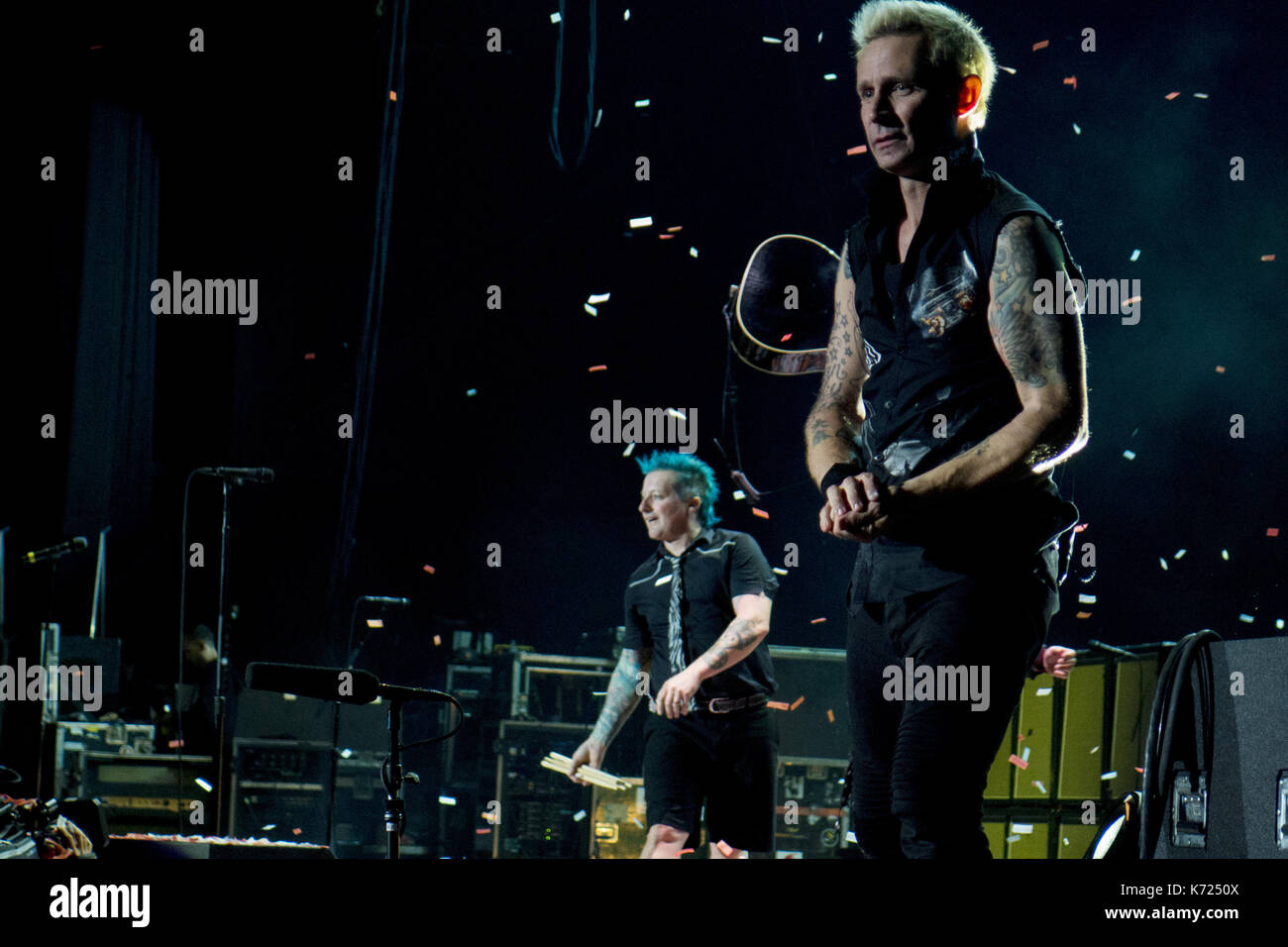 Chula Vista, CA, USA. 13th Sep, 2017. Drummer Tré Cool, left, and bassist Mike Dirnt of the rock band Green Day performs greet the crowd during a concert as part of their Revolution Radio Tour on Sept. 13, 2017. Credit: KC Alfred/ZUMA Wire/Alamy Live News Stock Photo
