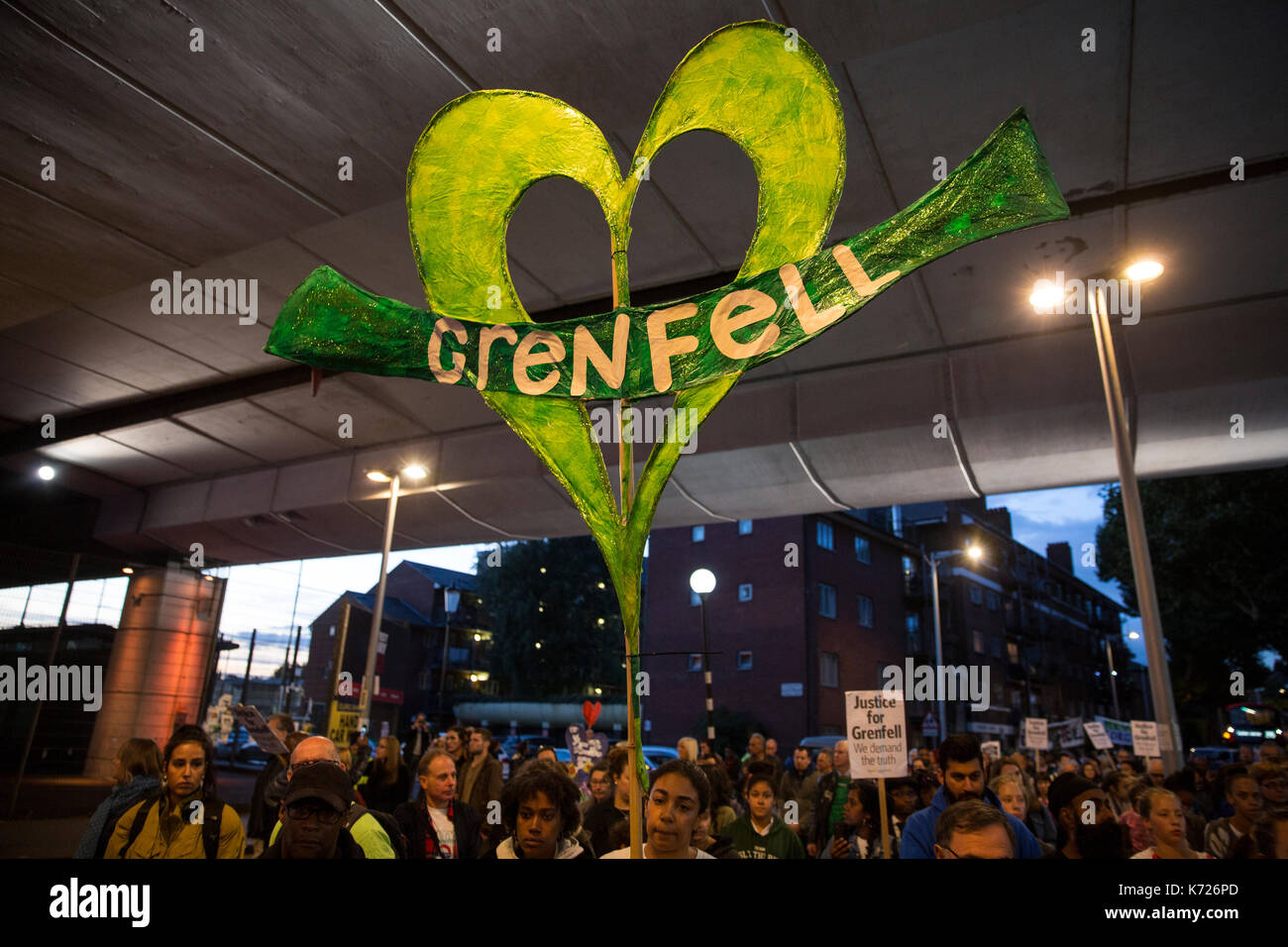 North Kensington, London, UK. 14th Sep, 2017. Hundreds join the silent walk in solidarity with the bereaved families and residents from the Grenfell tower fire 3 months ago on the 14th of June. The silent walk is held on the 14th of every month to pay respects. Today's march is also the opening day of the Grenfell tower fire public enquiry. 14th September 2017. Credit: Zute Lightfoot/Alamy Live News Stock Photo