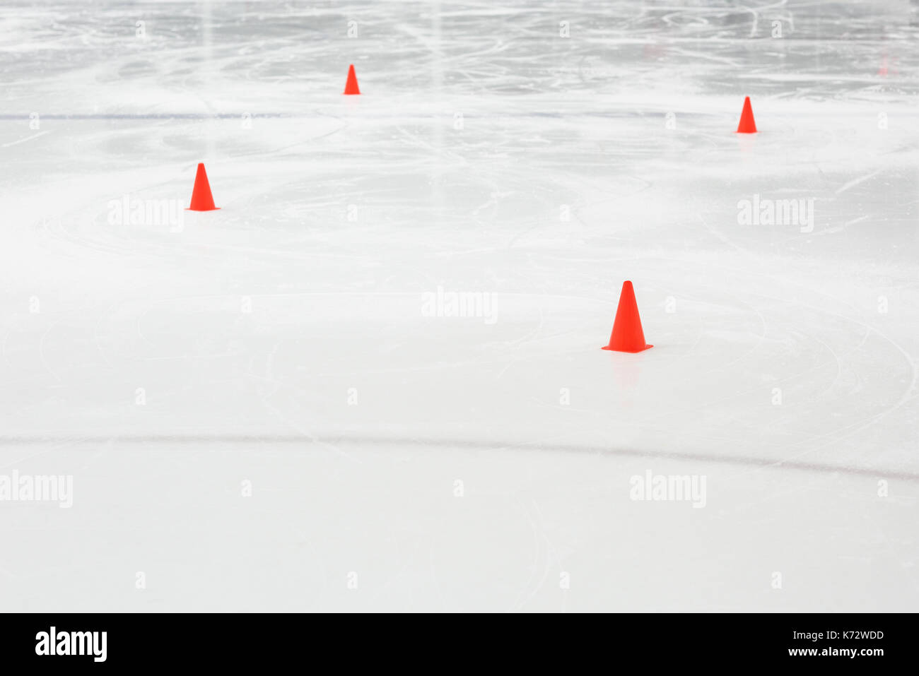 Orange sport training cones at empty ice hockey rink Stock Photo Alamy