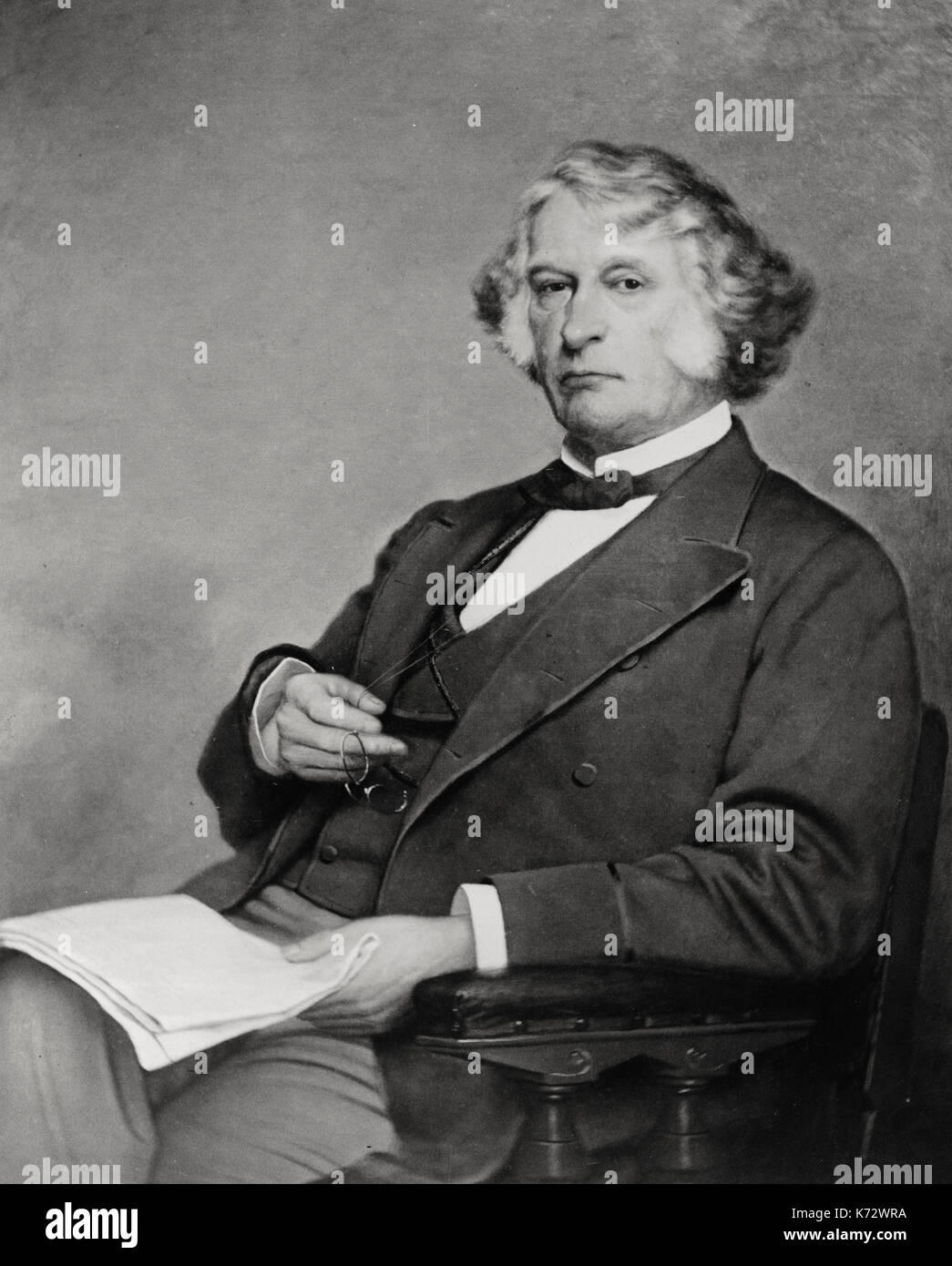 Charles Sumner, three-quarter length portrait, seated, facing left, circa 1873 Stock Photo