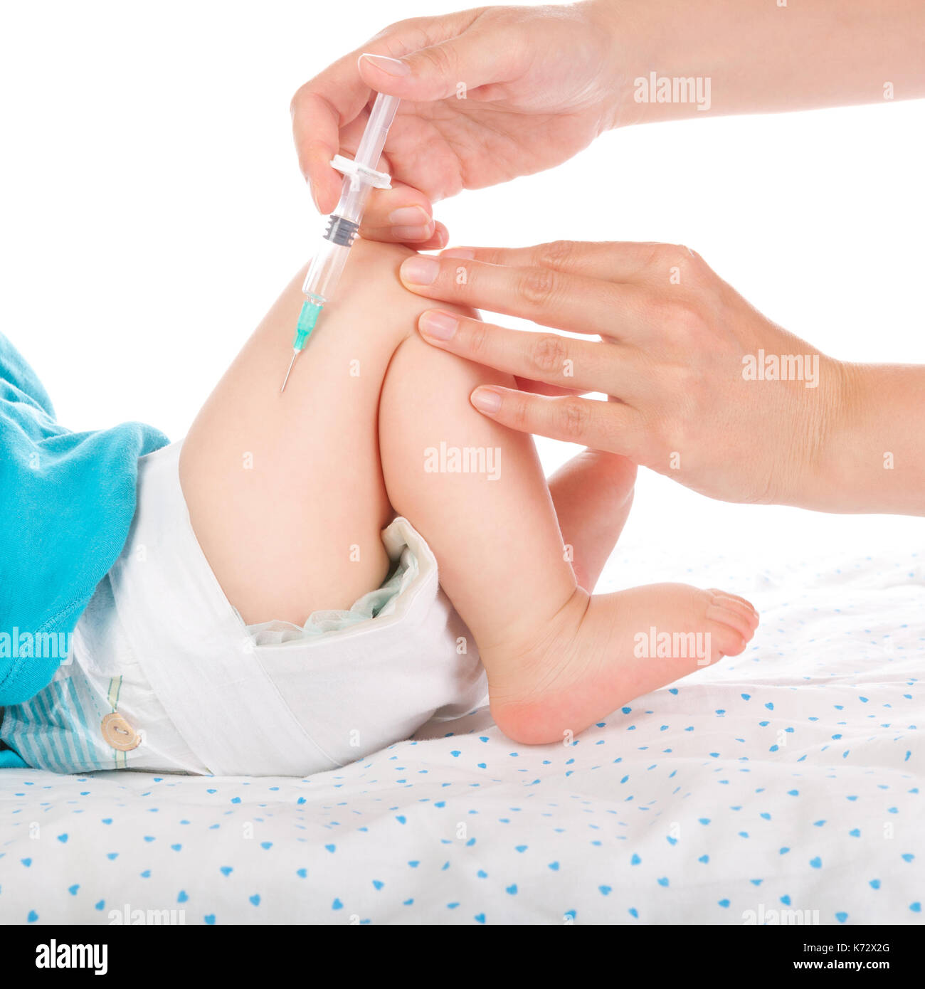 Baby Getting Injection On Leg on white background Stock Photo - Alamy