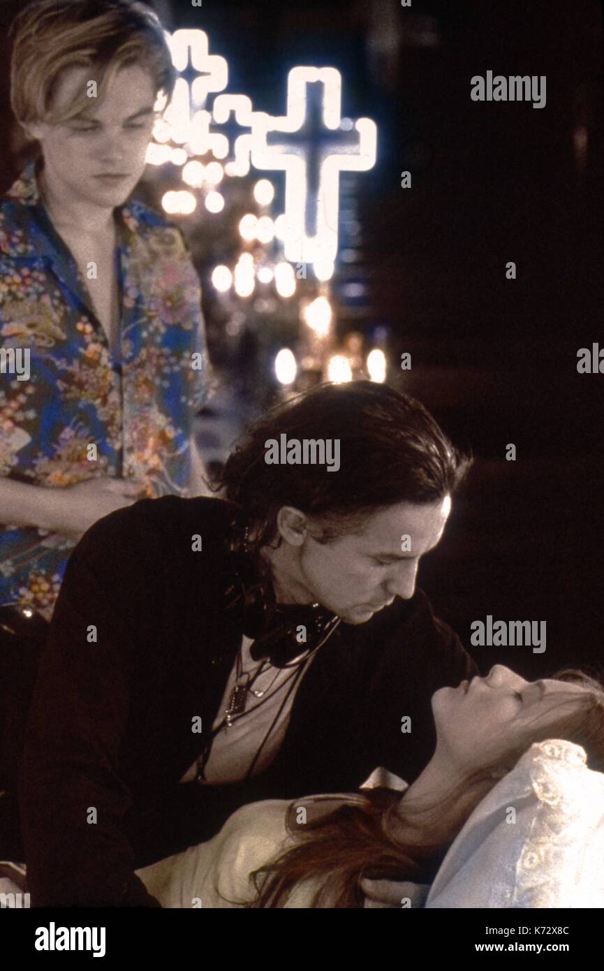 Romeo and Juliet   Year : 1996 USA  Director : Baz Luhrmann  Leonardo DiCaprio Baz Luhrmann, Claire Danes   Shooting picture  .  It is forbidden to reproduce the photograph out of context of the promotion of the film. It must be credited to the Film Company and/or the photographer assigned by or authorized by/allowed on the set by the Film Company. Restricted to Editorial Use. Photo12 does not grant publicity rights of the persons represented. Stock Photo