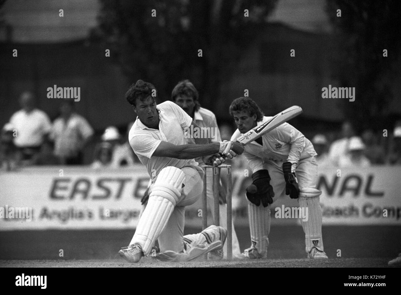 Essex batsman Derek Pringle in action against Worcestershire. Ian Botham, of Worcestershire, is in the background. Stock Photo