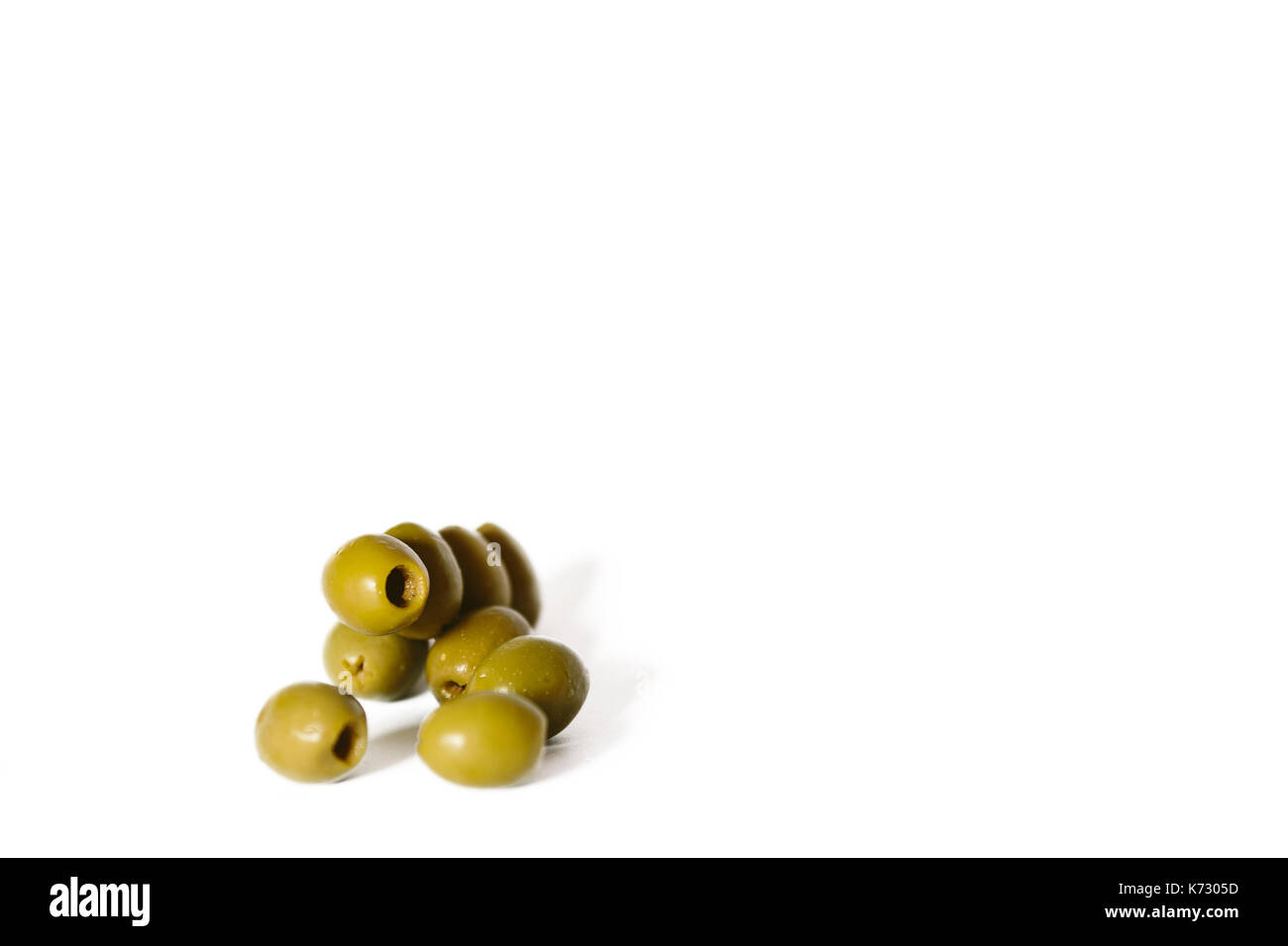 Green Olives isolated on white background Stock Photo - Alamy