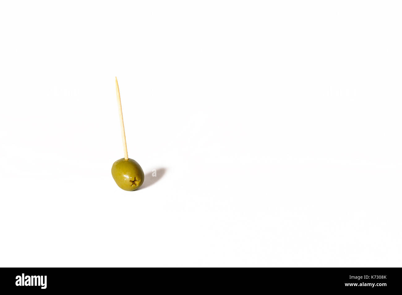 Green Olives isolated on white background Stock Photo - Alamy