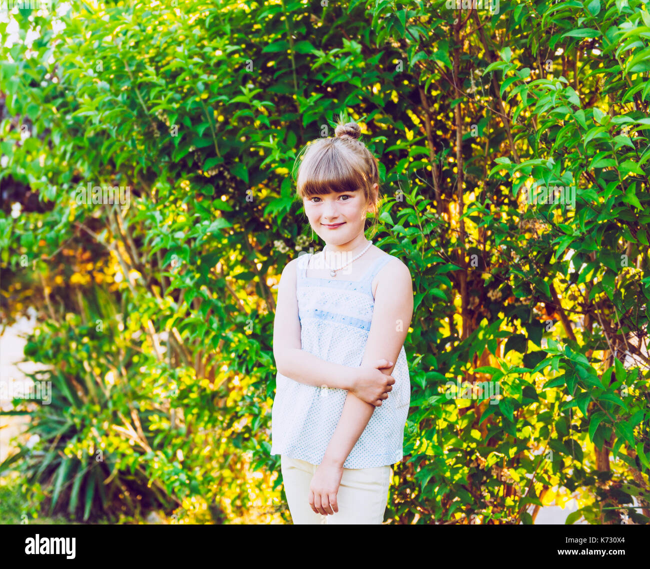 Outdoor portrait of a cute little girl Stock Photo - Alamy