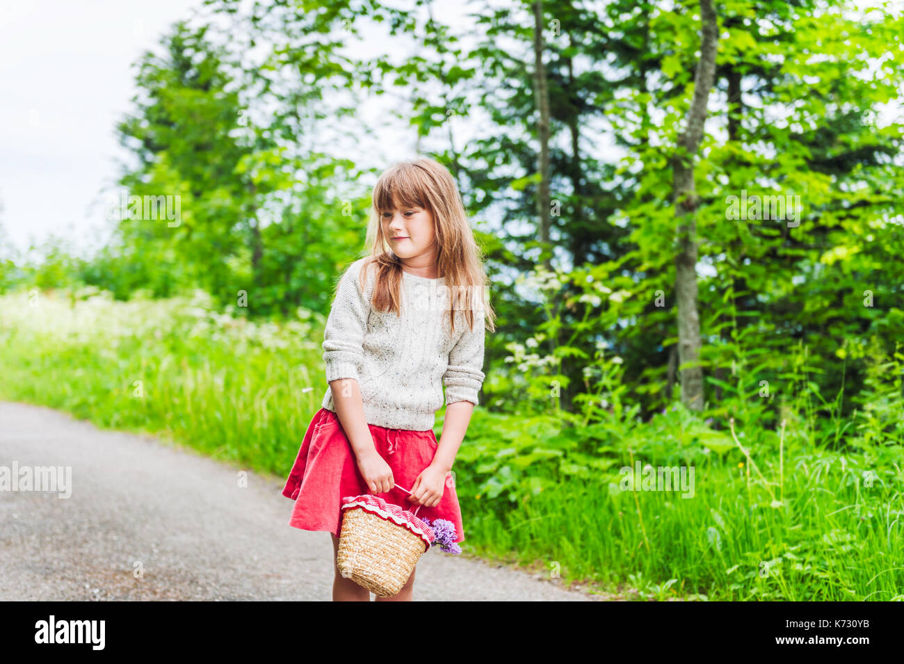 Outdoor portrait of little girl in the forest Stock Photo - Alamy