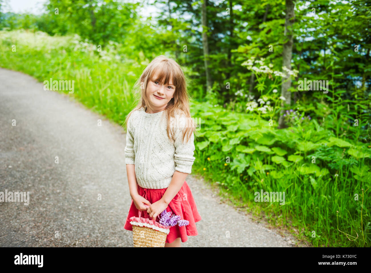 Outdoor portrait of little girl in the forest Stock Photo - Alamy