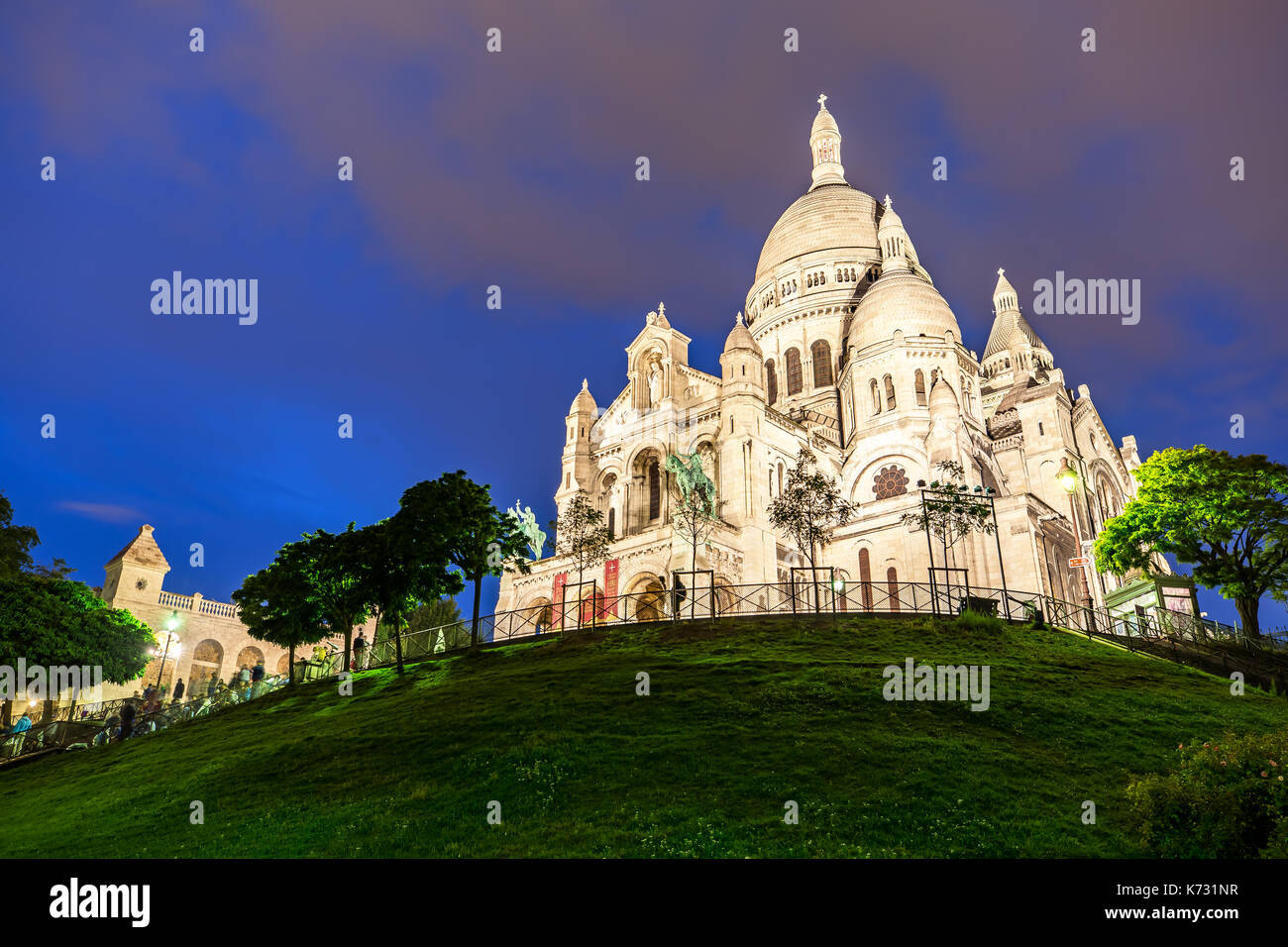 Sacre Coeur in Paris light up at Night Stock Photo