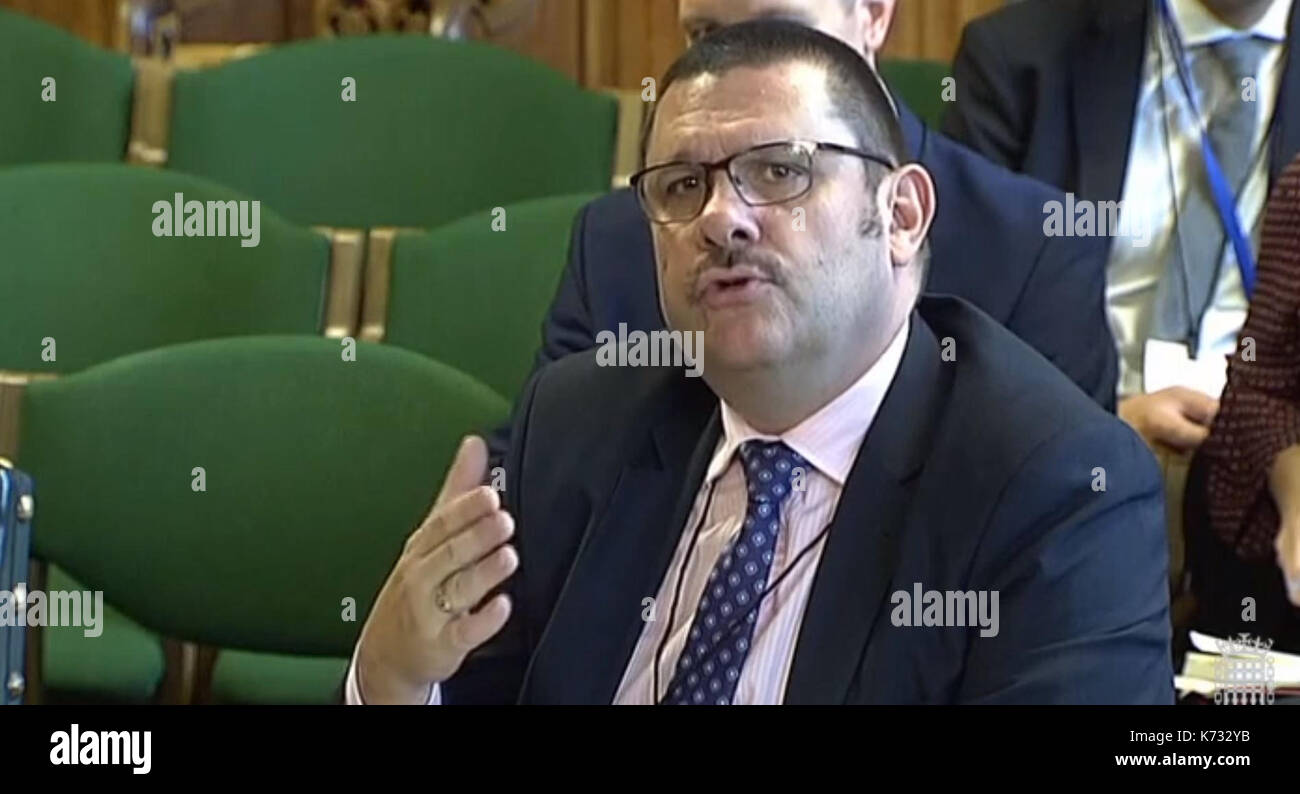 Chief Executive and Permanent Secretary Jon Thompson gives evidence to the Treasury Select Committee at the Houses of Parliament, London on the subject of HMRC Annual Report and Accounts. Stock Photo