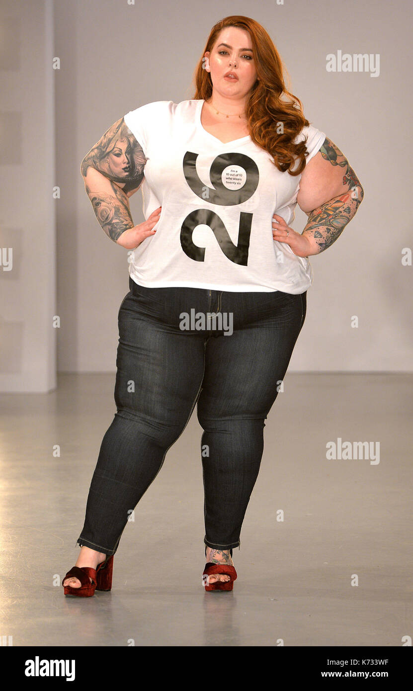 Model, Tess Holliday, wears a tee shirt with her size printed on it, during  a photocall for the 'Curve Catwalk' ahead of London Fashion Week Stock  Photo - Alamy