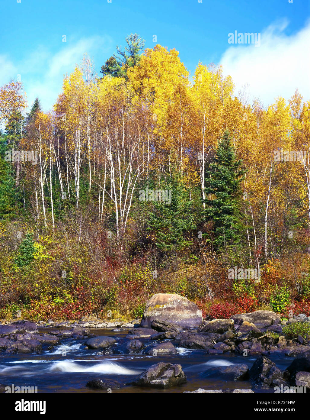 A fall view of the countryside surrounding Long Pond River, Maine, USA Stock Photo