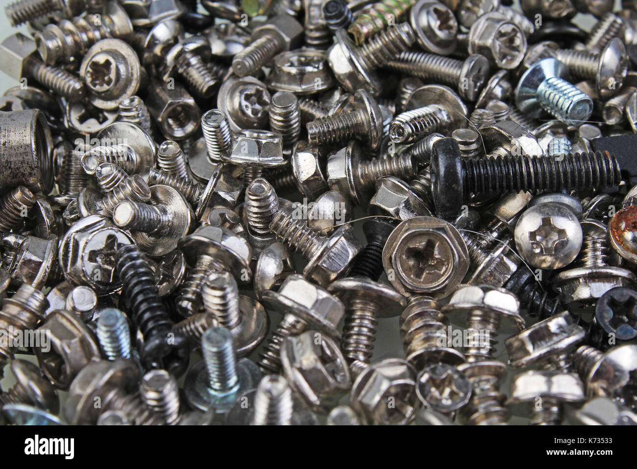 Nuts and bolts screw pattern closeup texture background wallpaper Stock