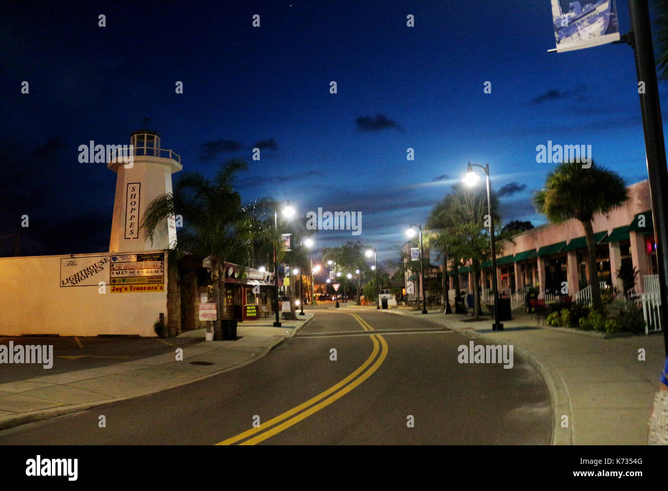 Downtown Tarpon Springs ( Florida Town ) at Dawn with Street Lights and dark blue skies. Stock Photo